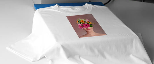 DTF printed white T-shirt with a woman's face creatively blended with colorful flowers